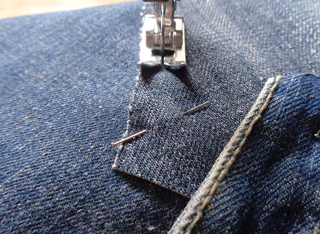 Sewing the scraps to make crazy denim patchwork