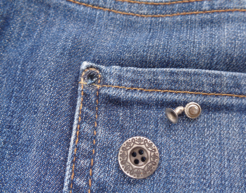Removing metal studs on jeans