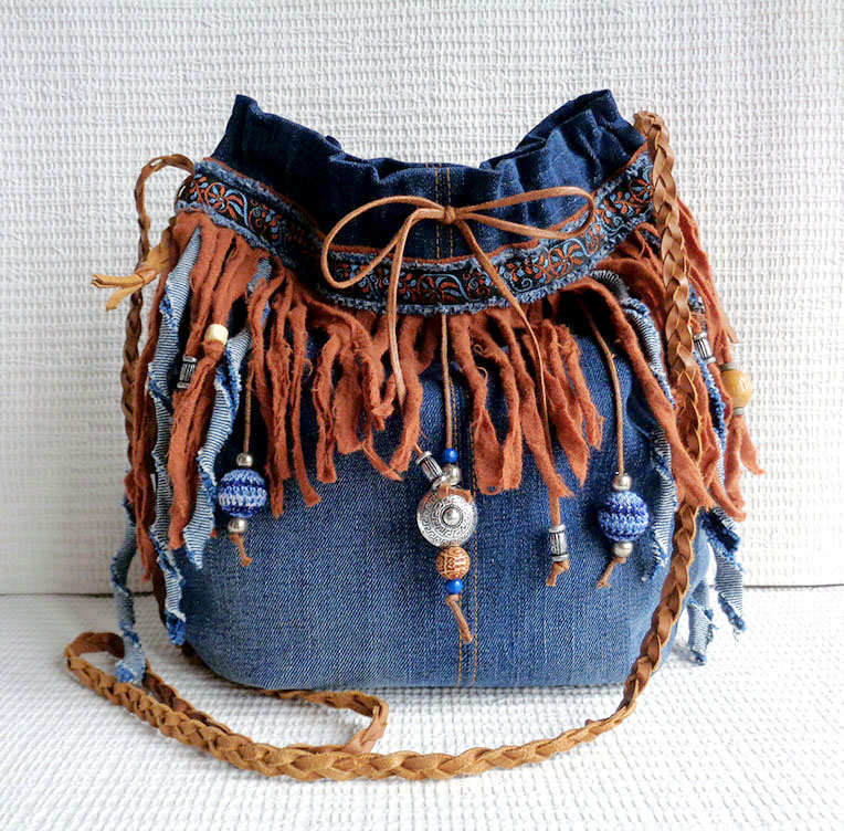 Handmade denim purse with fringe décor 